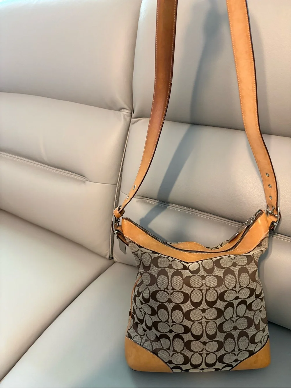 Coach Signature Canvas Shoulder Bag/Crossbody Hobo bag in Brown and Tan
